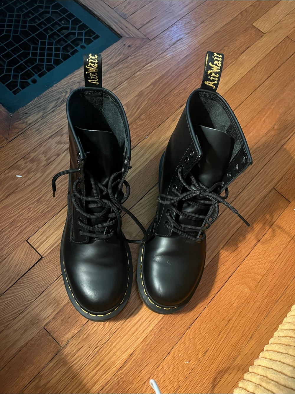 Dr. Martens Black Leather 8-Eye Lace-Up Boots with Yellow Stitching